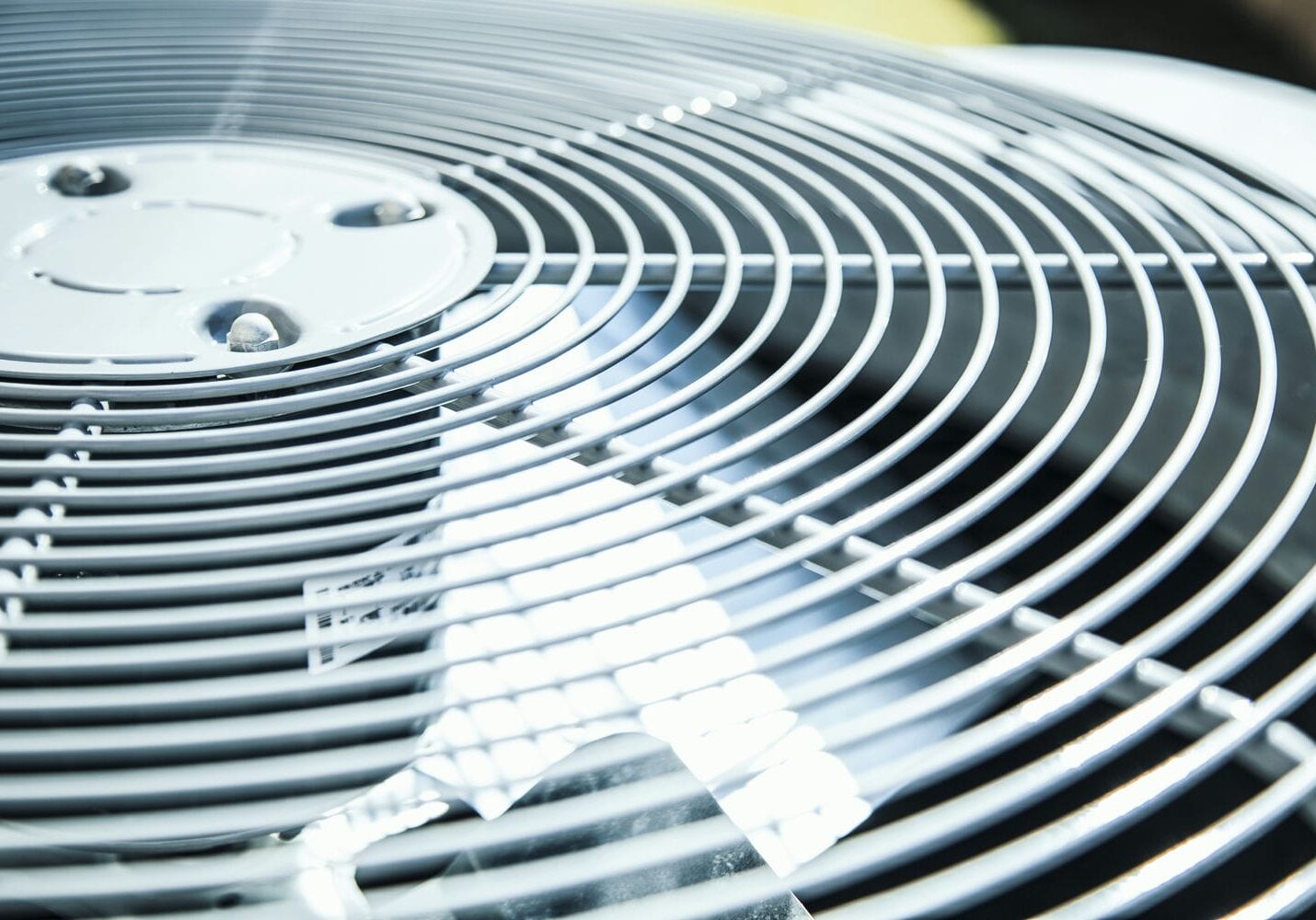 Outdoor air conditioner condenser with a still fan while the system is calling for cooling